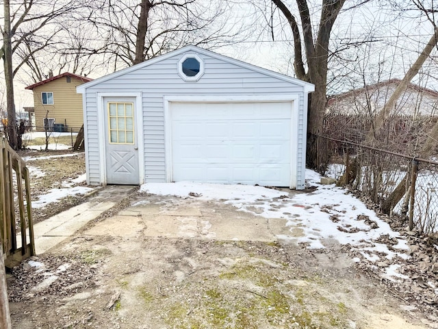 view of snow covered garage