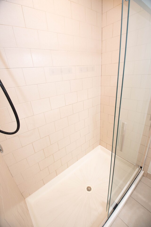 bathroom featuring a stall shower