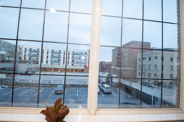 interior space featuring a city view and parking