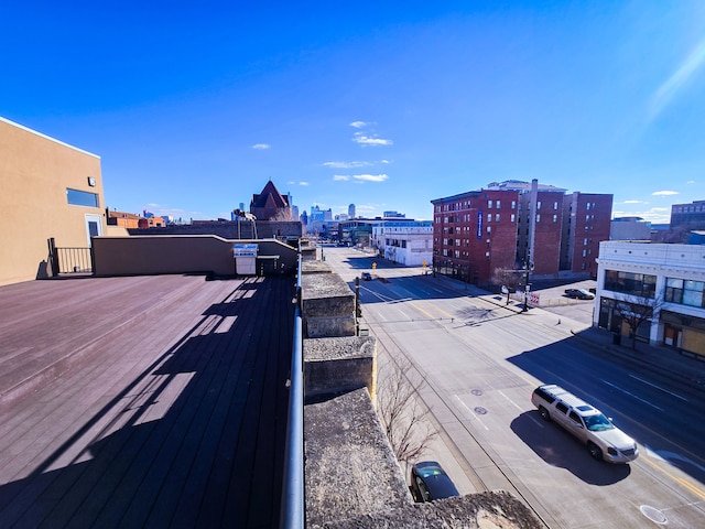 view of street featuring sidewalks and a city view