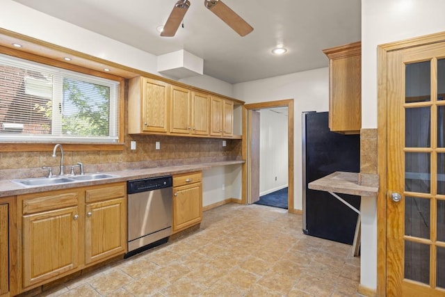 kitchen featuring sink, decorative backsplash, dishwasher, and ceiling fan