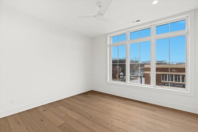 156 N Center St Unit 302, Northville, MI 48167 - empty room with ceiling fan and light wood-type flooring