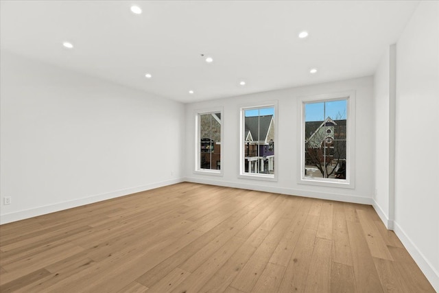 unfurnished room featuring light wood-type flooring