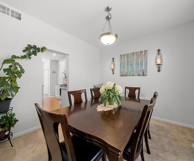 view of carpeted dining room