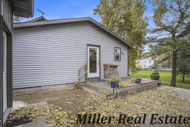 doorway to property with a wooden deck