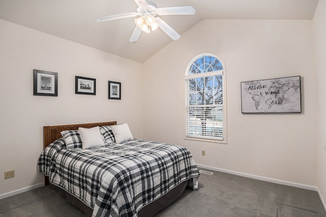 carpeted bedroom featuring vaulted ceiling and ceiling fan