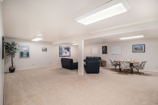 living area with light colored carpet