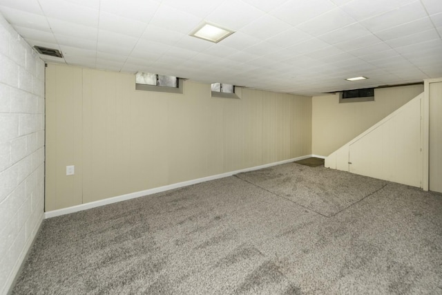 basement with carpet flooring