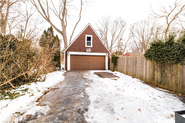 view of snow covered garage