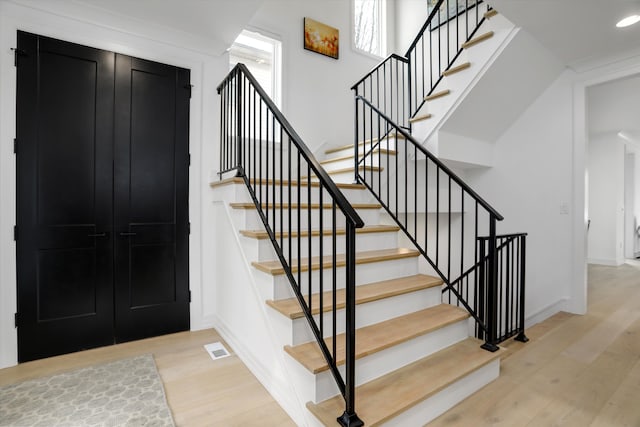 entryway with light hardwood / wood-style floors