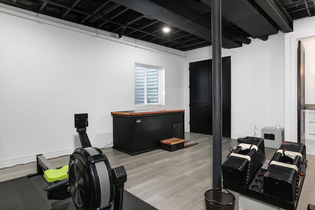 exercise area with hardwood / wood-style floors