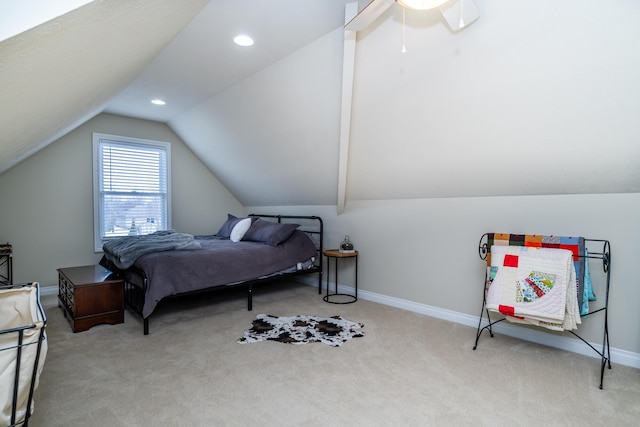 carpeted bedroom featuring vaulted ceiling