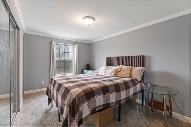 bedroom featuring ornamental molding and carpet flooring