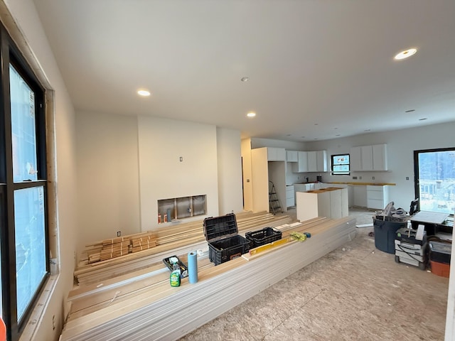 interior space featuring stairway and recessed lighting