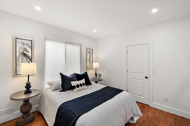 bedroom featuring hardwood / wood-style flooring