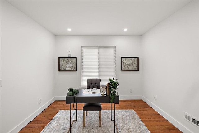 office with hardwood / wood-style floors