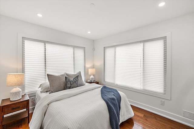 bedroom featuring hardwood / wood-style floors