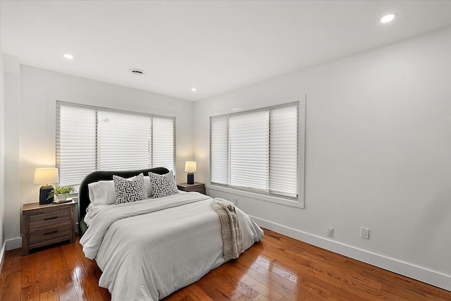 bedroom featuring dark hardwood / wood-style floors