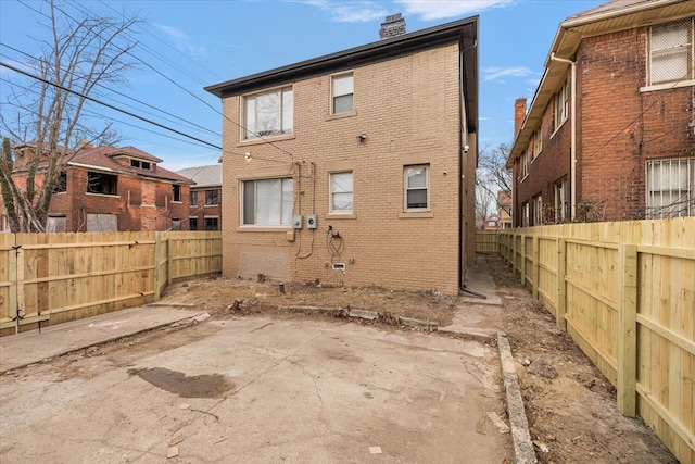 back of property featuring a patio