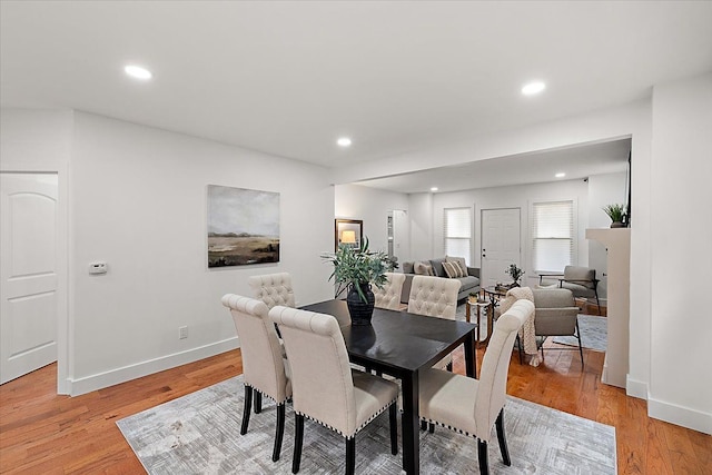 dining space featuring light hardwood / wood-style flooring