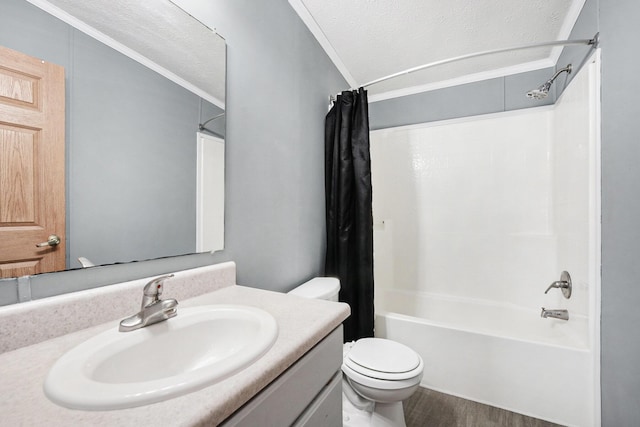 full bathroom with wood-type flooring, shower / bathtub combination with curtain, a textured ceiling, and vanity