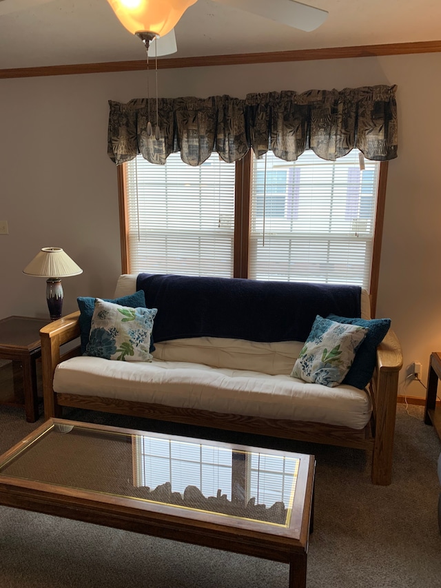 carpeted living room with crown molding