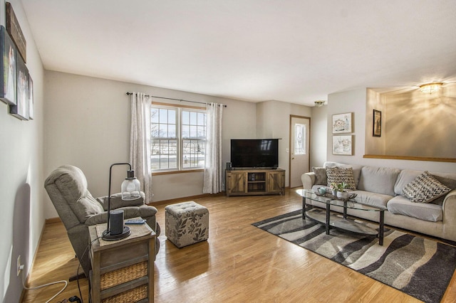 living room with light hardwood / wood-style floors