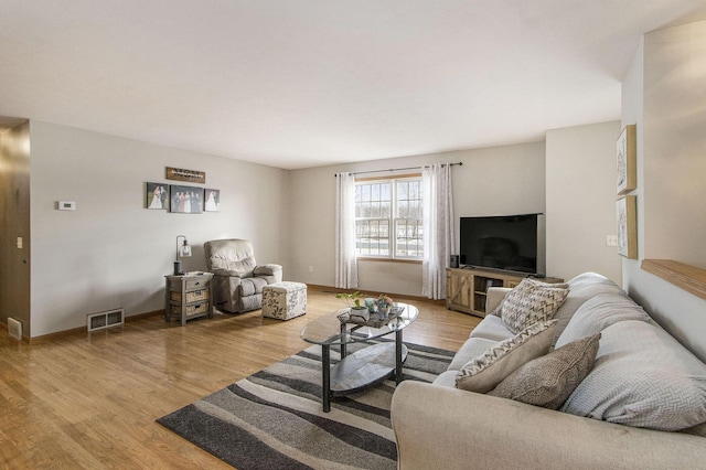 living room featuring light wood-type flooring