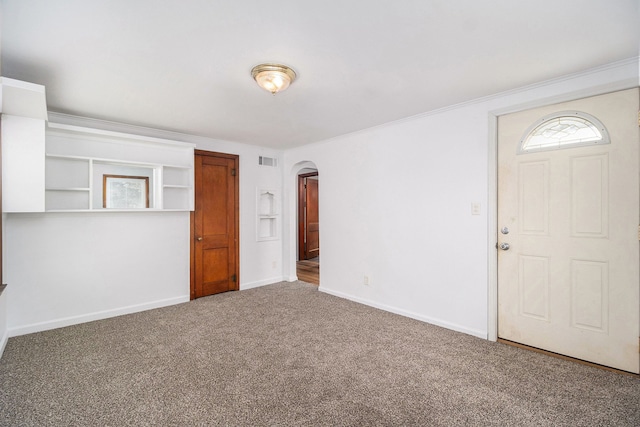 interior space featuring ornamental molding