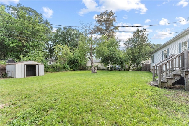 view of yard featuring a storage unit