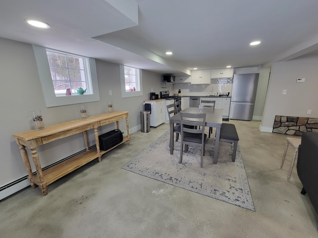 dining room featuring sink