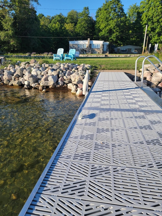 view of pool with a water view