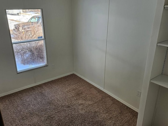 2054 Woodside Dr, Caro, MI 48723 - empty room featuring carpet and baseboards