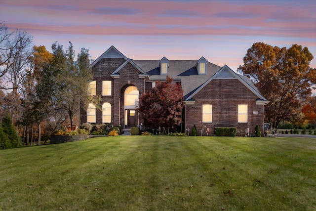 front facade with a lawn