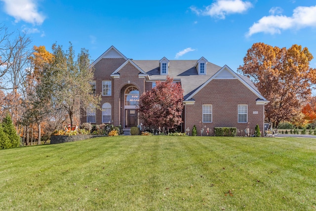 front facade with a front lawn