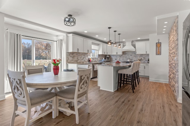 dining area featuring light hardwood / wood-style floors