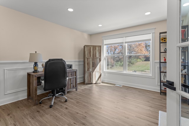 office area with light wood-type flooring