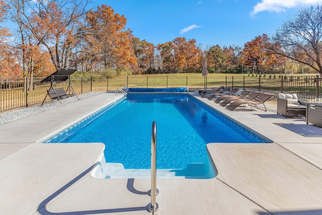 view of swimming pool with an outdoor hangout area and a patio area