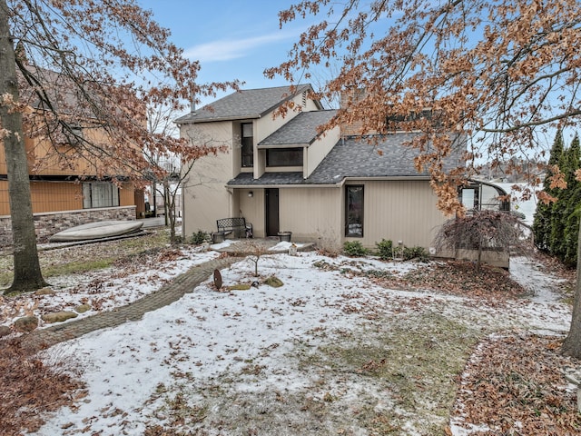 view of snow covered property