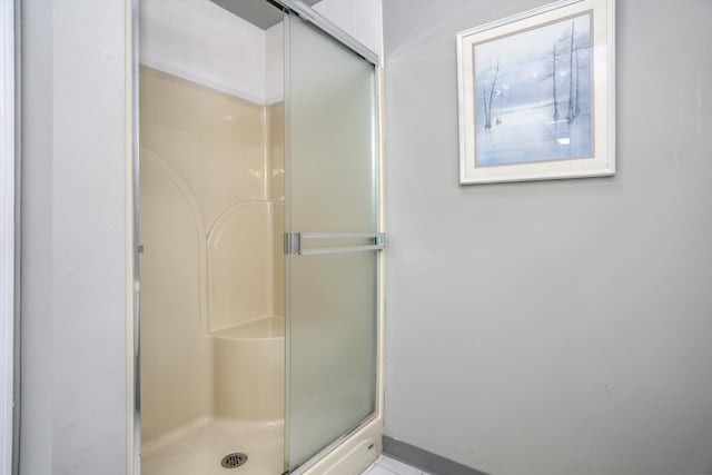 bathroom with an enclosed shower