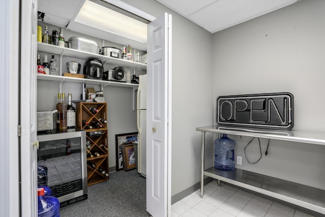 pantry featuring wine cooler