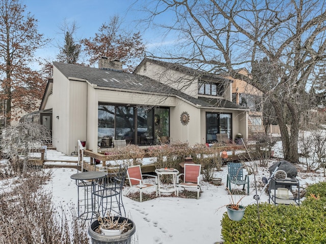 view of snow covered property