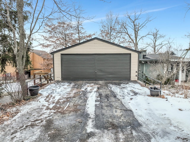 view of snow covered garage