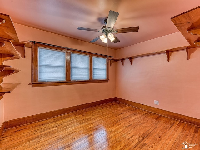 spare room with ceiling fan and light hardwood / wood-style floors