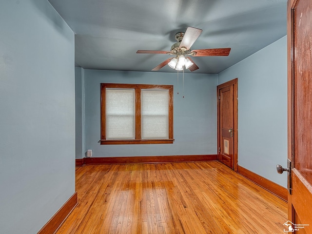 unfurnished room featuring ceiling fan and light hardwood / wood-style flooring