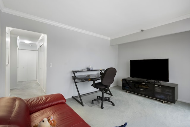 office space with baseboards, crown molding, and carpet