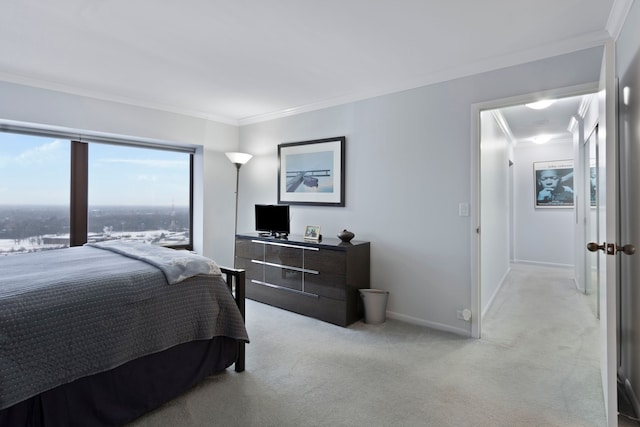 bedroom with crown molding and light carpet