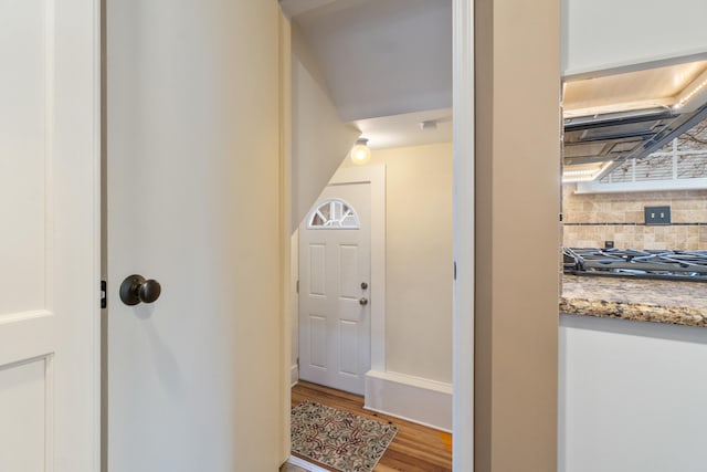 corridor featuring light hardwood / wood-style flooring