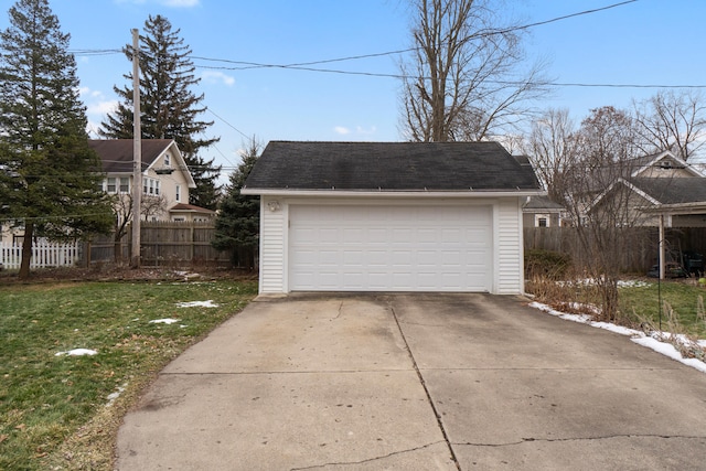 garage featuring a yard