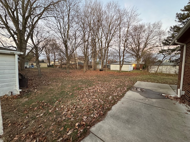 view of yard with a patio area